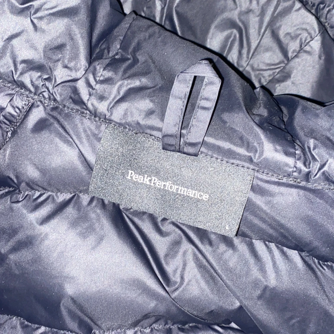 Svart dunjacka från Peak Performance - 92