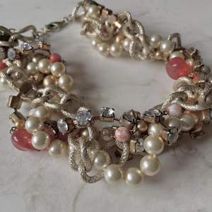 Chunky Pearl and Sequin Necklace  gold toned necklace with pearls, coral toned beads, and sequins  gently worn, best styled around a collared shirt