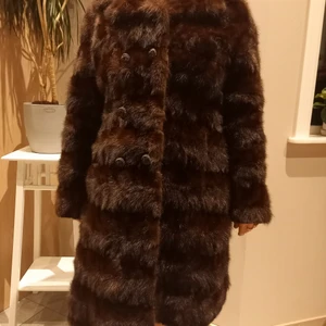 Minkkappa - Jackor & ytterplagg, stl. 38 (S), Dam 1000 kr Säljer pälskappa i mink. Från 1972, originalkvitto kan fås med. Armlängd ca 56cm. Längd från axel ner ca 104cm