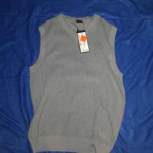 Vest gråblå - Kostade 70 