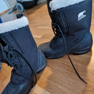 Sorel vinterskor - Oanvända. 26cm höga