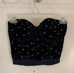 Topshop bustier crop corset bandue top - Beautiful blue velvet corset from Topshop. Does not fit me anymore 😨. So hopefully someone else loves it! Great condition! 
