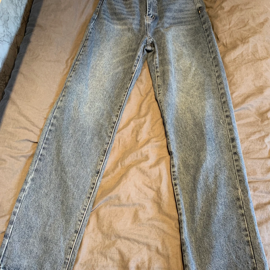 Högmidjade jeans i storlek S