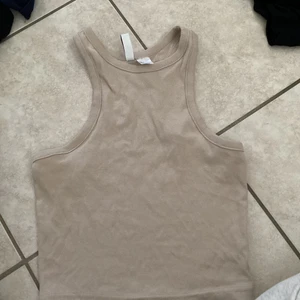 Crop top - En Crop Top från H&M i storlek S, aldrig använd