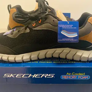 Skechers- Air Cooled Memory Foam- Brand New shoes with tag and box. Amazing Color Combination of Black and Brown. 