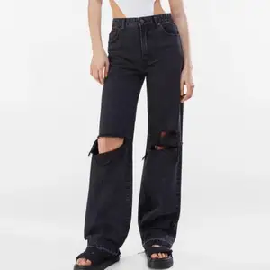 Bershka High Waisted Wide Leg Distressed Leg 90s. Faded black. Zip fly. Cotton. Size 36. Wore 1x for IG. Gently used excellent condition. Purposefully distressed. Can take more pics/measurements. Pet/smoke free home. Pls expect wear in 2nd hand items.