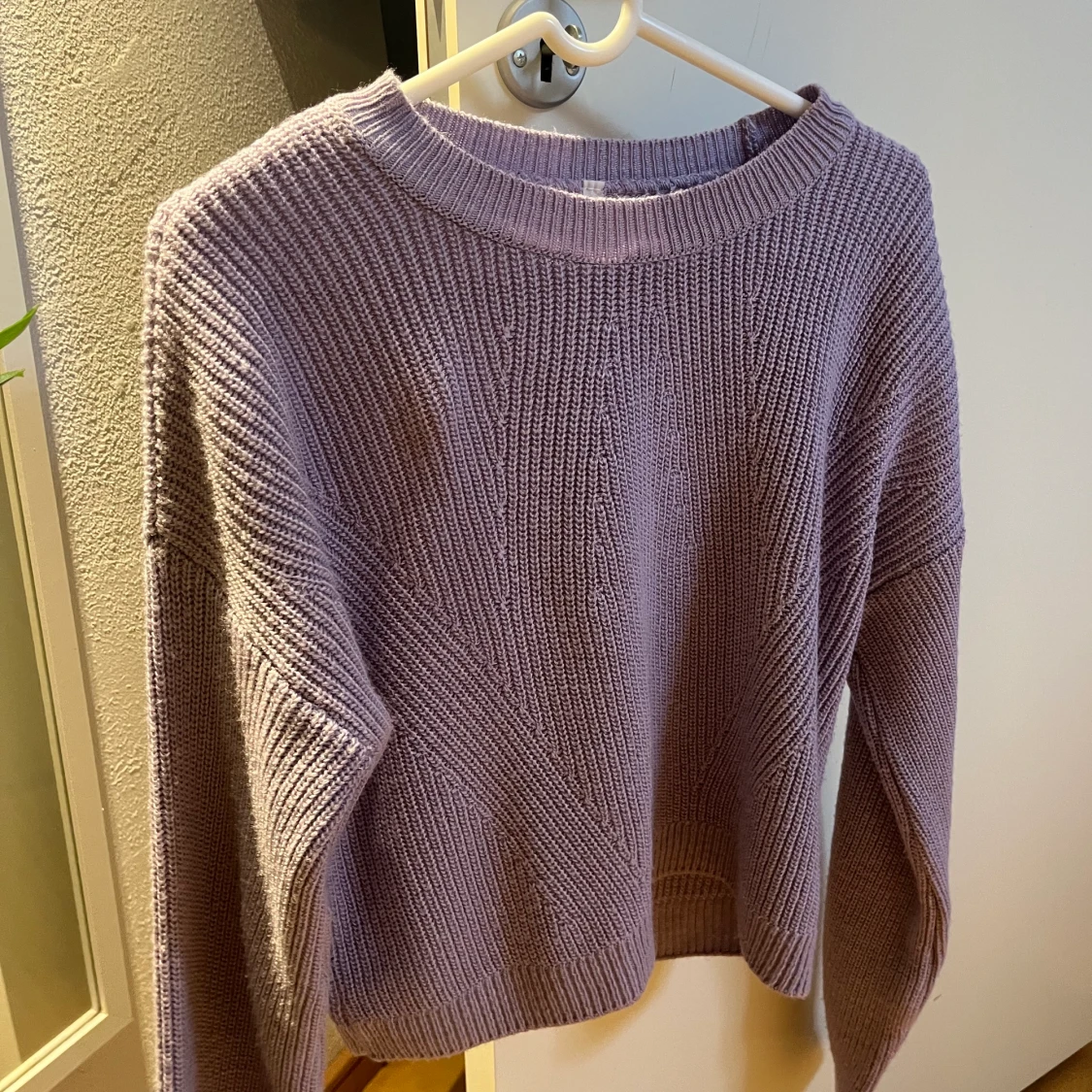 Lila stickad tröja