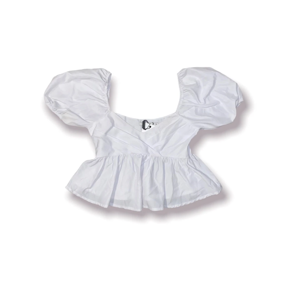 Vit topp med puffärm