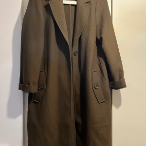 Lång kappa  - Kappa från hm i mörkgrön, bra skick