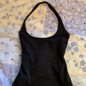 Halterneck Topp - Vanlig svart halterneck från H&M i storlek XS 💗