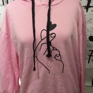 Hoodie  - En rosa hoodie 