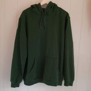Grön hoodie från H&M storlek large relaxed fit