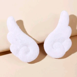 Hårclips med vingar - Hårclips med vingar, i fint skick, använda en gång.