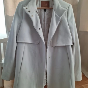 Kappa - Fin kappa i storlek m//l Storlek m/l