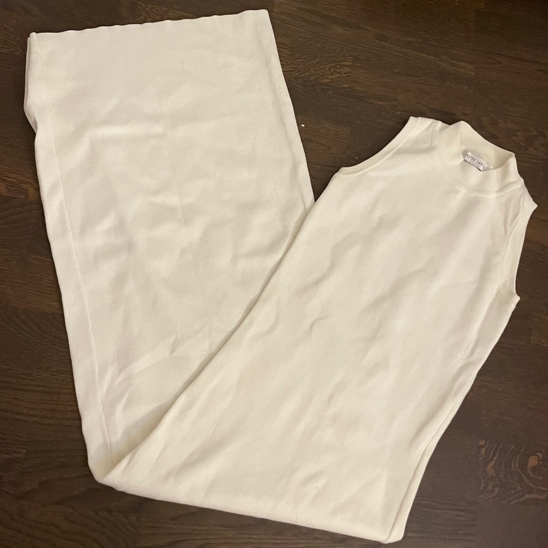 Vit klänning fodral ärmlös tight XS