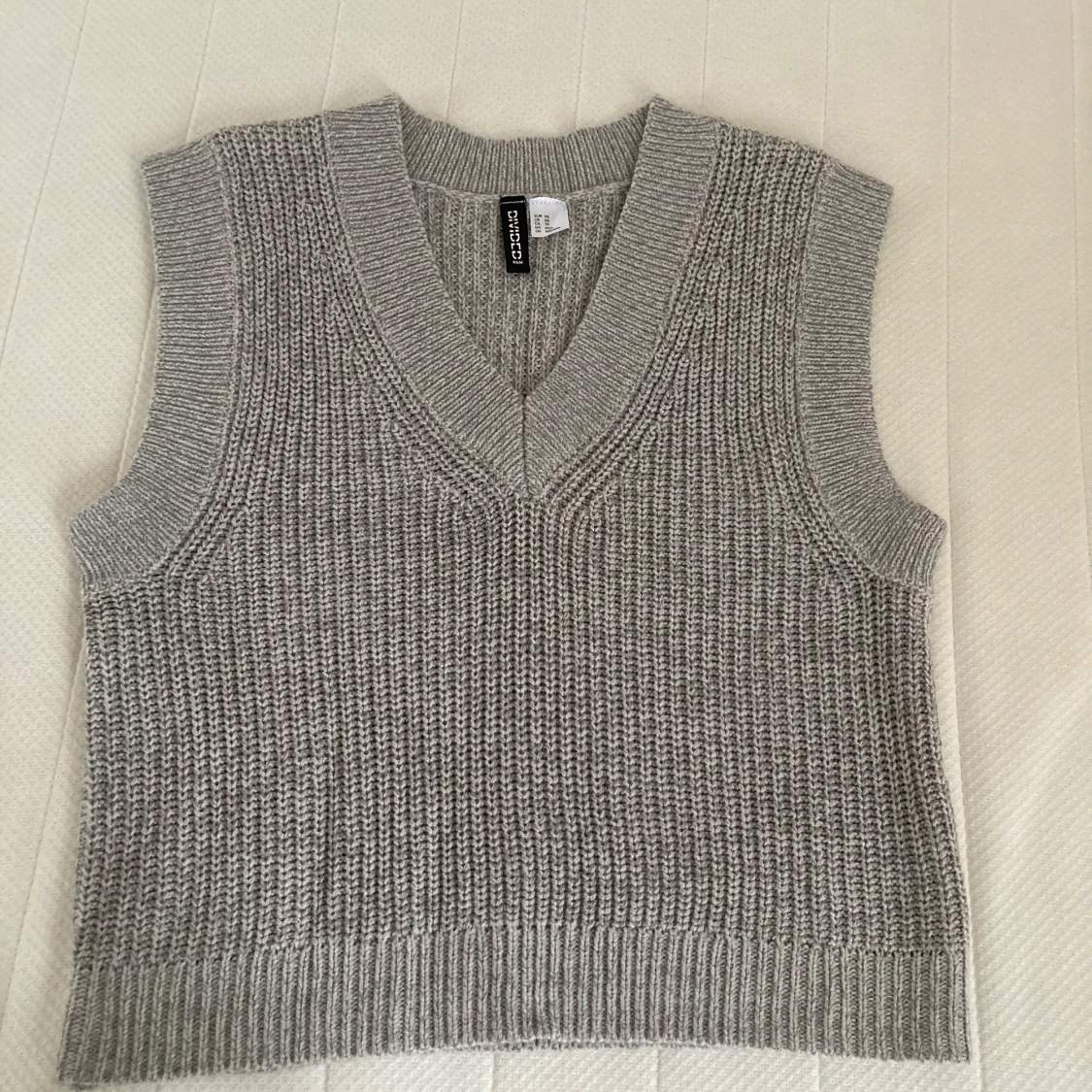 Stickad tröja från HM i storlek XS