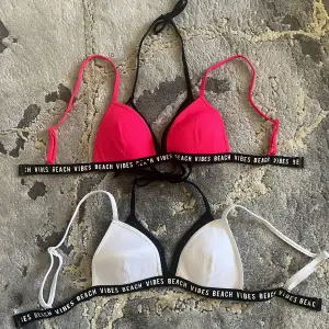 Två bikini överdelar i rosa o vitt. Aldrig använda!  Priset är för båda tillsammans.