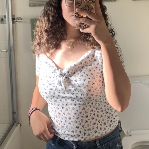 Floral - White shirt with blue floral 