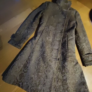 Desuagal kappa brun - Brun kappa desuagal strl S.