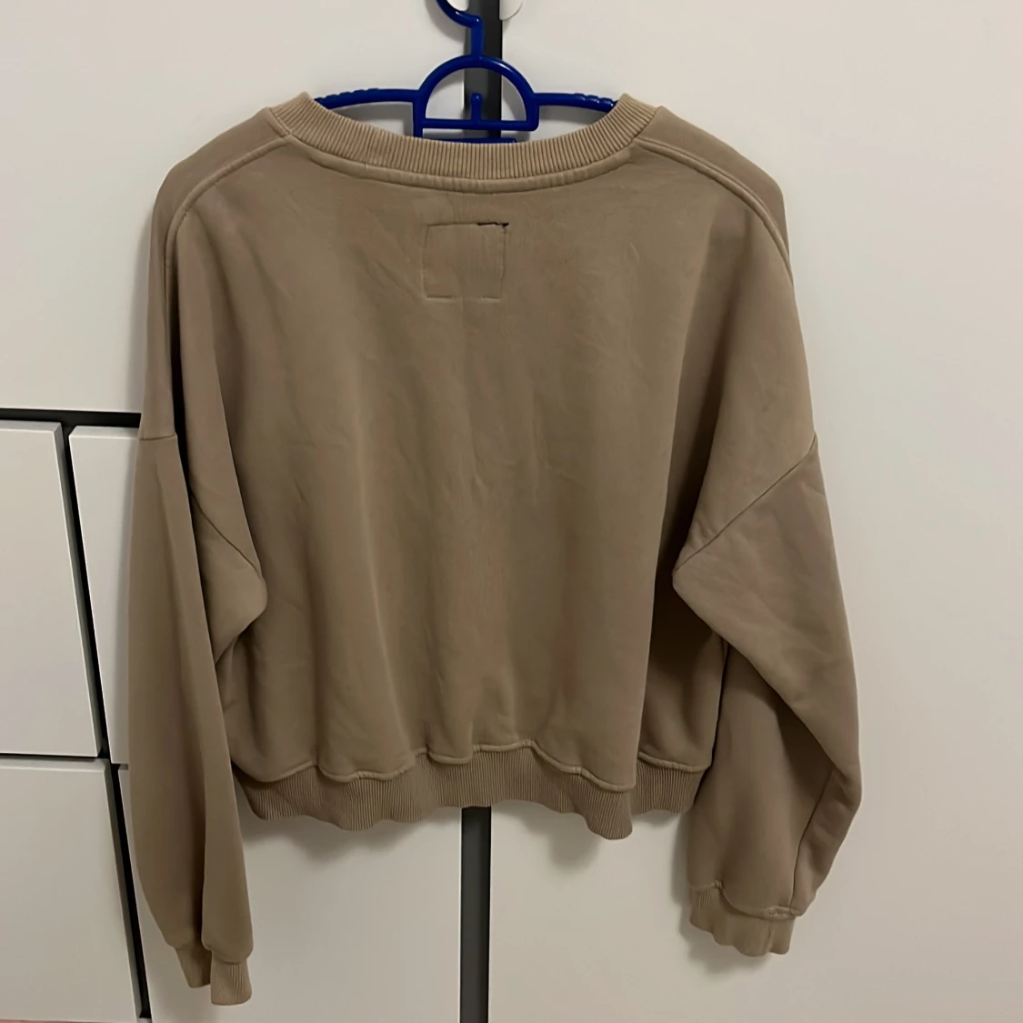 Huddie utan luva beiga bre kvalitet