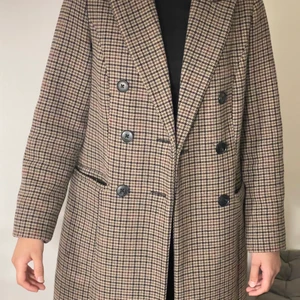 Rutig Ullmix Kappa - Fin rutig ullmix kappa i mycket gott skick. 