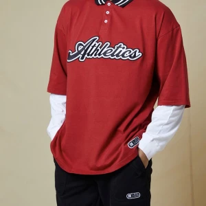  oversized athletics applique faux sleeve polo - Condition: almost new