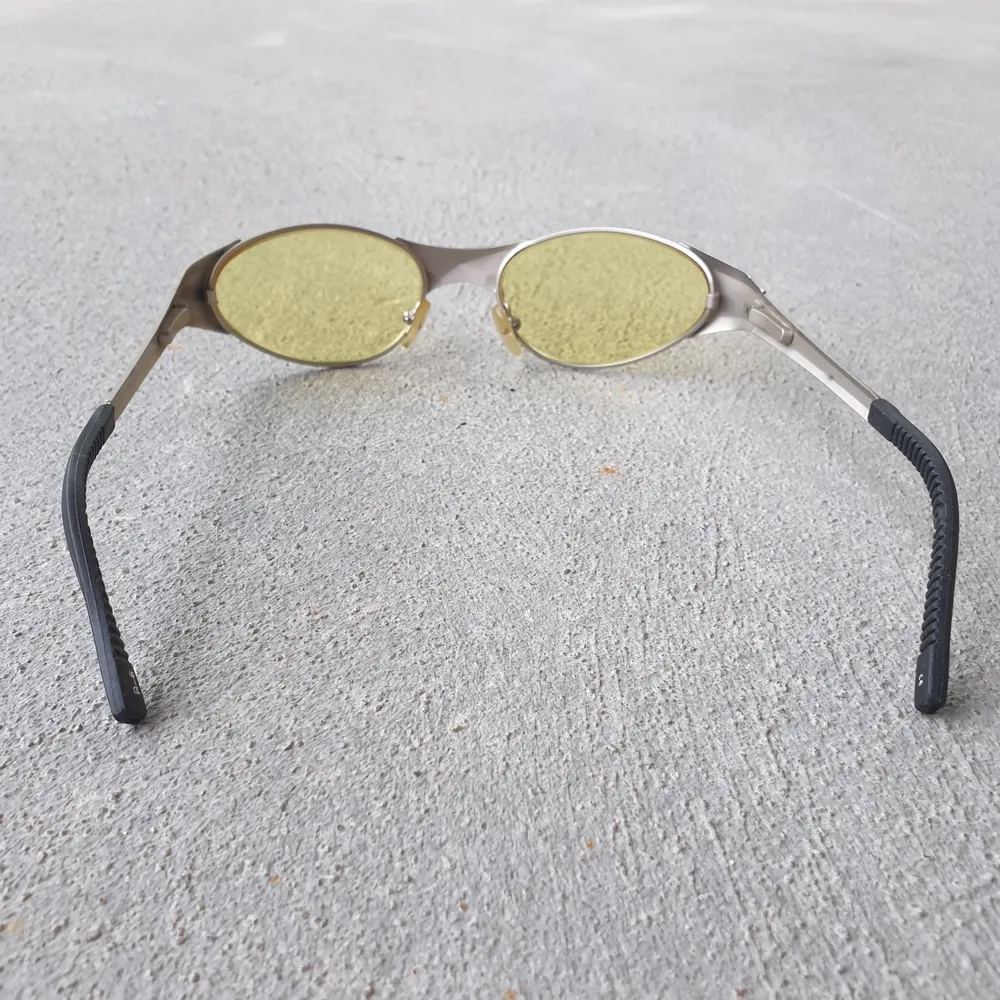 Y2K era sunglasses. Put these on and it's always 🌞.  Yellow and silver with rubber parts. Very cyber goth/Euphoria vibes. 🦋 see my page for more authentic y2k glasses. Accessoarer.