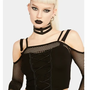 Black mesh layering top brand new  - I hate to sell this awesome top but I purchased the wrong size. Fits a small/medium but more on the small side. Bought from dollskill for 600kr. Brand new never worn. Sold out on Dollskill