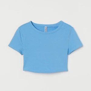 Kort ljusblå t-shirt  - Jätte fin ljusblå t-shirt i XS som aldrig kom till användning. 