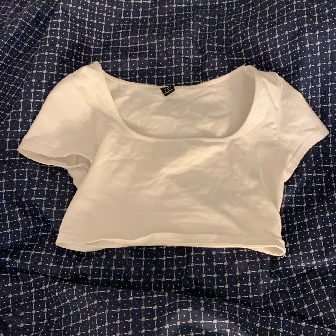 Vit uringad magtröja 