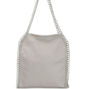 Tiamo väska  - Hej jag säljer nu min beigea väska från tiamo som knappt är andvänd.