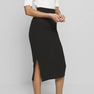 Kjol - Pennkjol. Aldrig använd endast testad. 