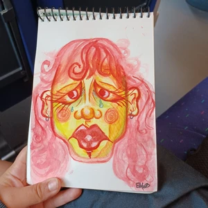 Målning av Illustativt ansikte - Vattenfärgsmålning (gjord med van gogh vatten färg) på a5 vattenfärgspapper (tjockt).  Säljer denna men om någon är intresserad av detta motiv på canvas eller i större format med bakrundsfärg kan vi diskutera ett pris så målar jag det till dig 