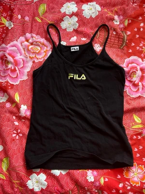 Fila-linne - Jättefint linne från fila, köpt på humana second hand!