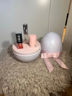 CAIA Beauty Easter Egg  - Selling a CAIA Beauty Easter Egg containing a Vanilla Days Eau de Parfum (travel size), Berry Smoothie Blush, and StickBerry Jelly Lip Oil. All products are brand new, unused, and unopened💗