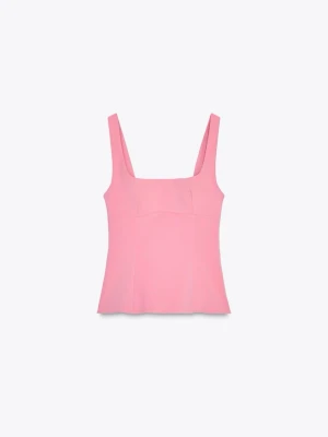 Rosa topp med rosett från Zara - Supersnygg rosa korsettopp från Zara med breda axelband och fyrkantig urringning. Toppen har en unik detalj med stor rosett och öppen rygg.         🌸❗️Säljer då den är för stor för mig och toppen har aldrig använts