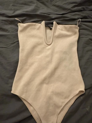 Snygg body - Jätte fin rosa body, den ser inte så rosa ut på bild fast den är rosa. Pris kan diskuteras❣️