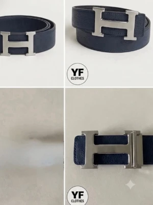 Mörkblått bälte med silver H-spänne - Snyggt mörkblått bälte i skinn med ett stort, stilrent H-format spänne i silverfärg. Perfekt accessoar för att lyfta din outfit och ge en exklusiv touch. Bältet har en klassisk design och passar till många olika stilar.