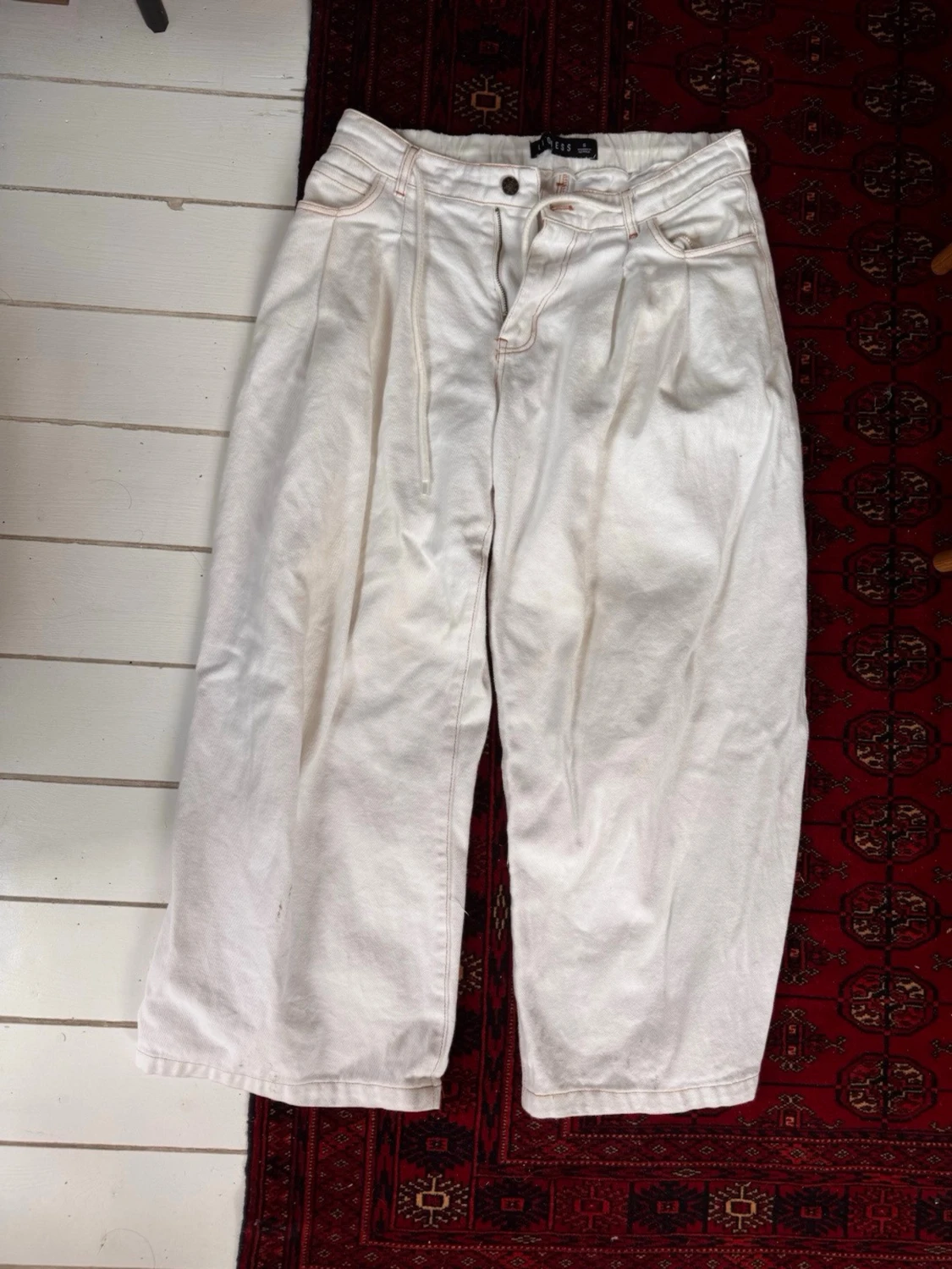 Lioness vita jeans low rise o baggy