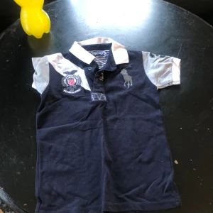 Polo Ralph lauren pique  - Andvänd 1 gång strl 126