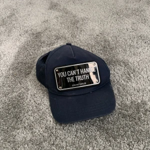 John Hatter keps blå - Den är 8 av 10 har använt några gånger men tröttnatt på den