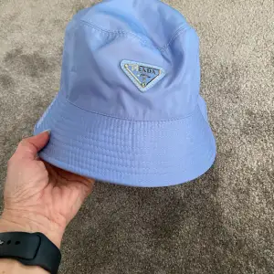 Ljusblå hatt onesize 