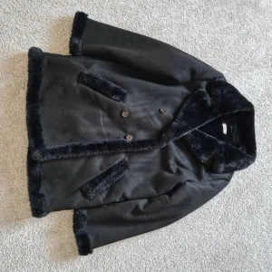 Kappa - Fin svart kappa i bra skick. 