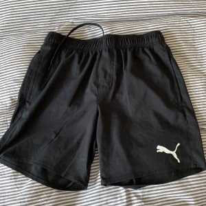 Puma badshorts - Puma badshorts i nyskick. Oanvända. Storlek S.