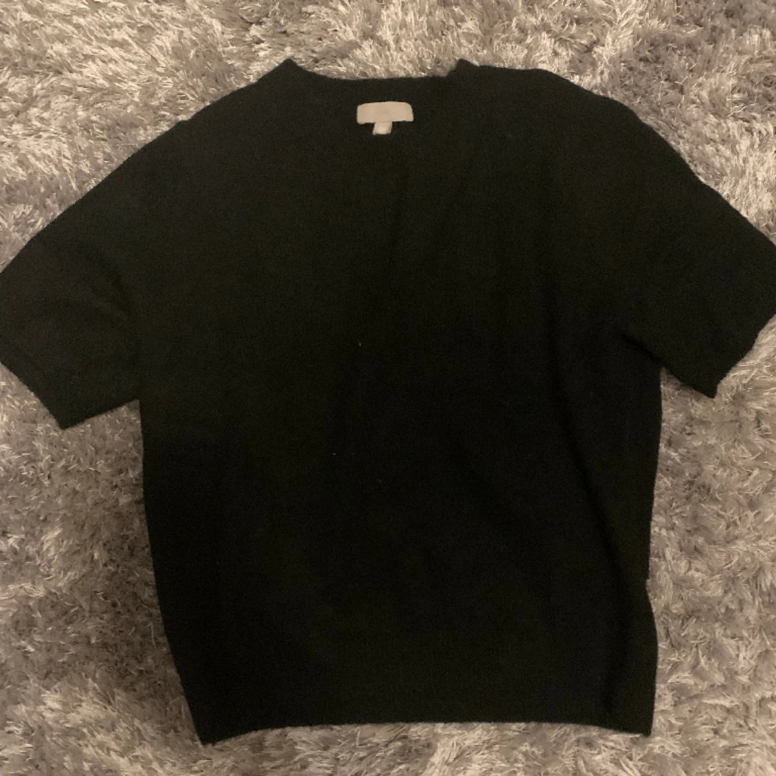 Svart stickad T-shirt  - 91