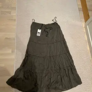 jättesnygg vintage kjol som aldrig använts, storlek 36-38 ungefär