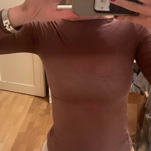 Intisimissi långarmad! - En knappt använd intisimissi långarmad i beige/lila!! Jättefint skick😍