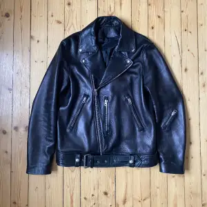 Iconic biker jacket from Acne Studios. Comes in a relaxed fit, slightly oversized. Has been gently used, no flaws.