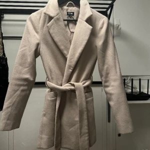 Kappa - Beige söt kappa från bubbelpoom som inte kommer till användning längre.