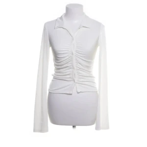 Blus - Fin blus från Nelly som aldrig kommit till användning. 